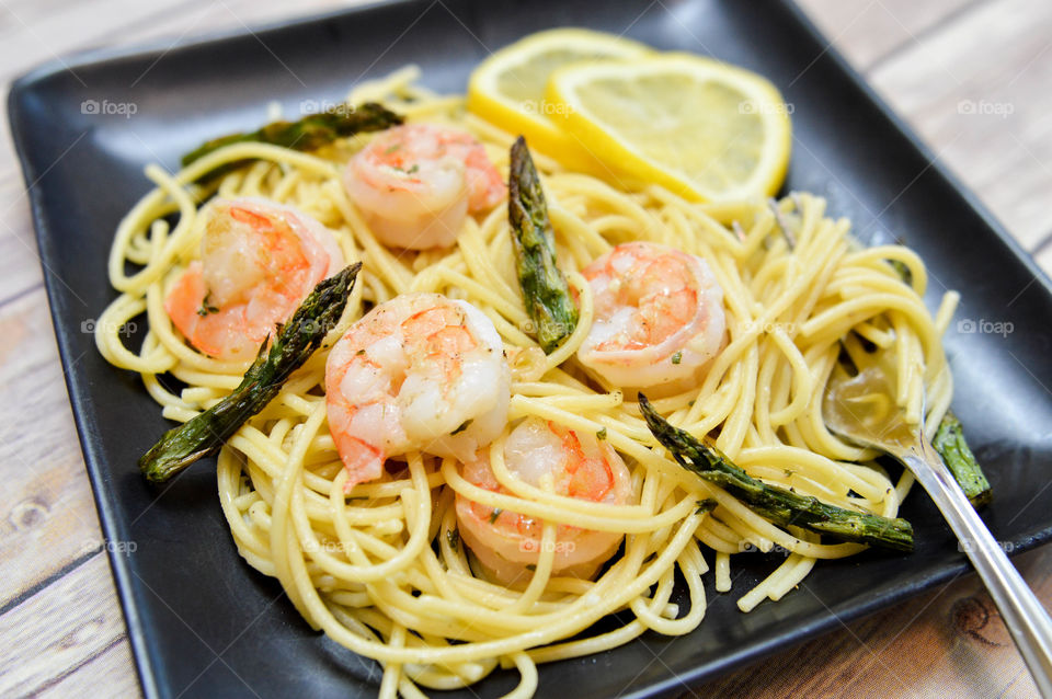 Close-up of spaghetti pasta with shrimp