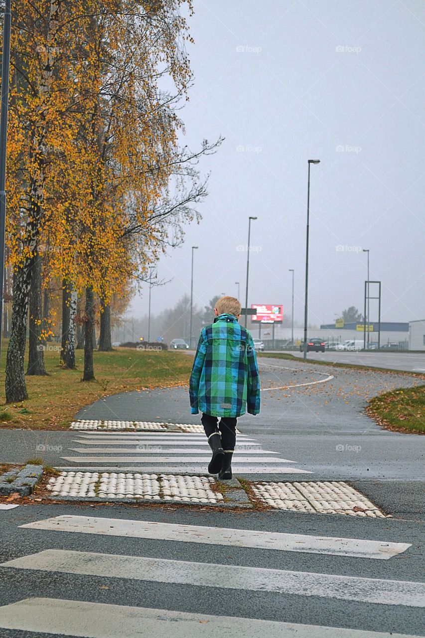 Boy walking in the city