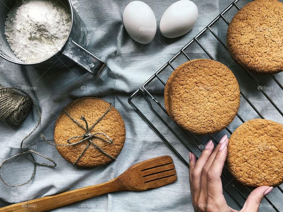 Overheard view of ingredients for preparing homemade cookies in rustic style 
