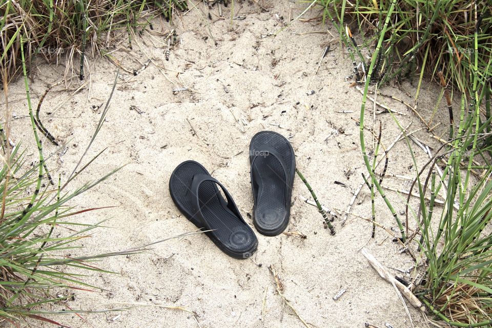 Totes sandals at beach