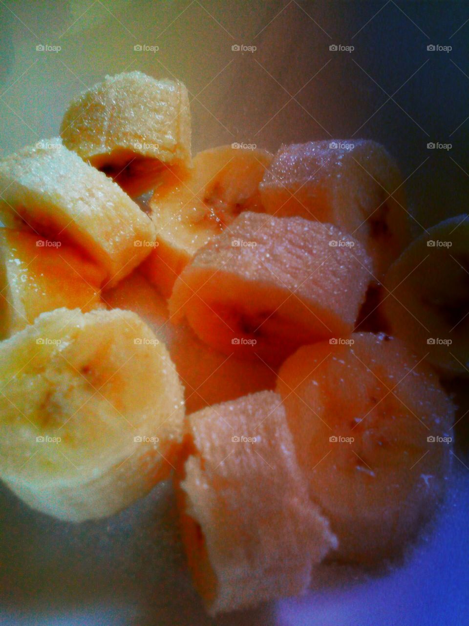 bananas. banana cut up with sugar