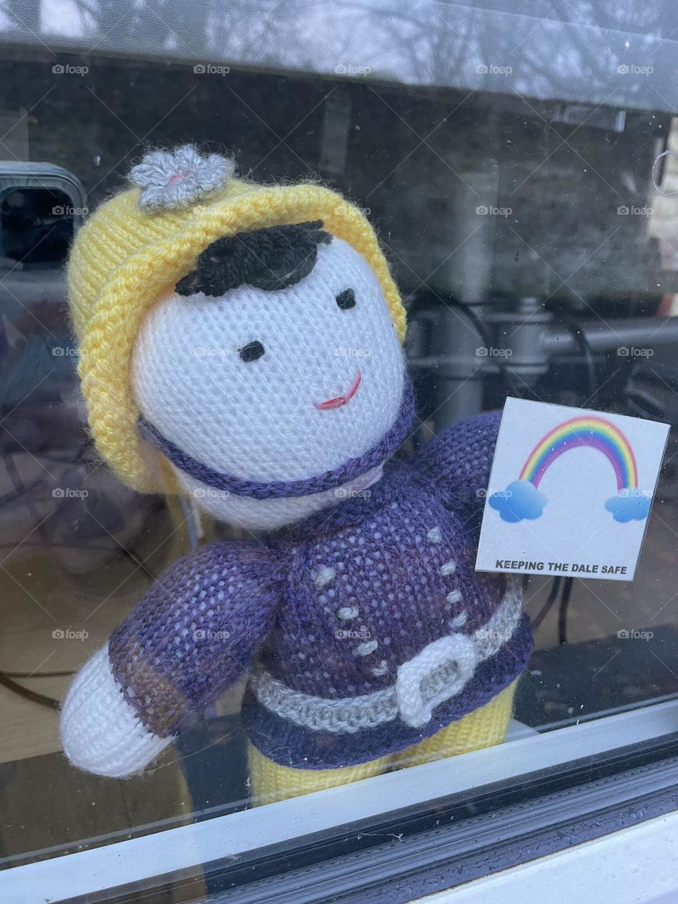 Cute knitted toy in a fire station window 🥰