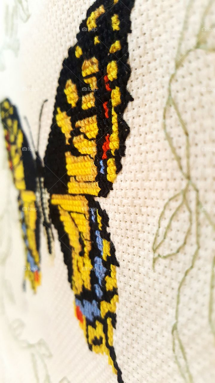 Butterfly cross-stitch close up view