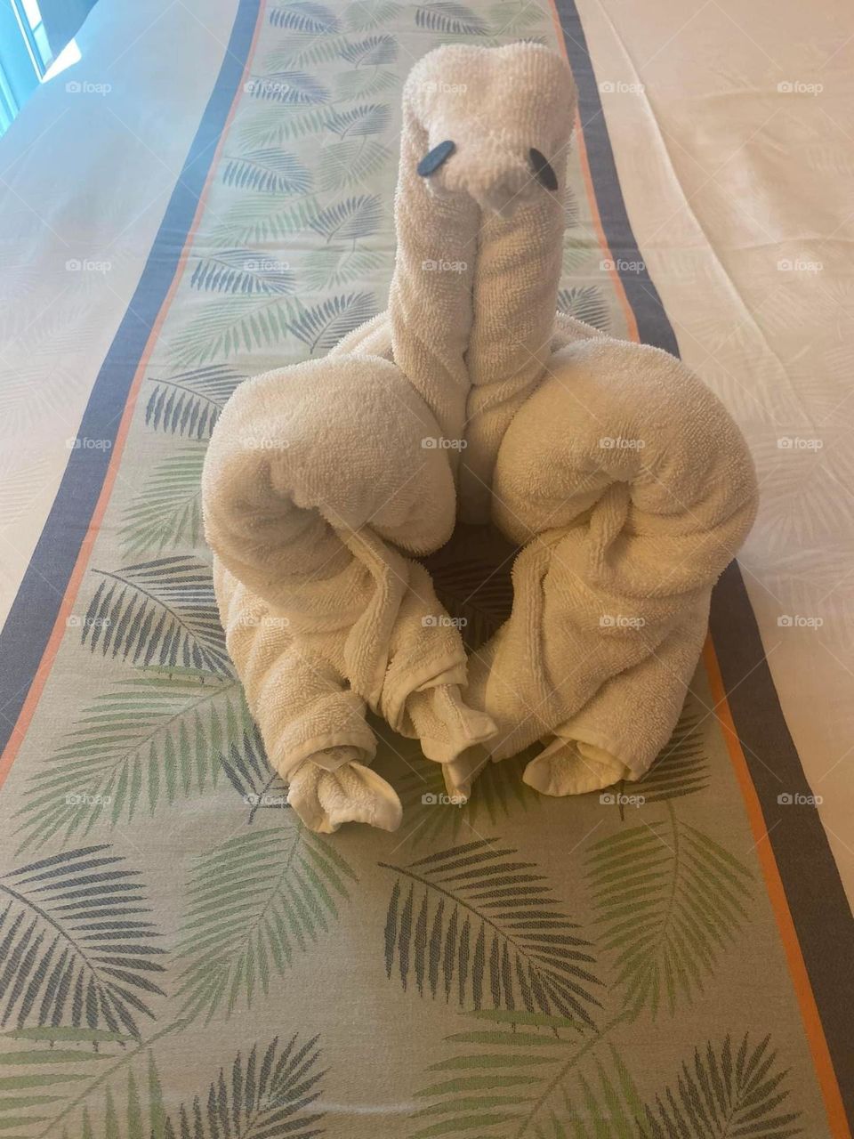 A sloth is made of towels on a cruise ship. Towel art is a fun way to be welcomed back to one’s room. 