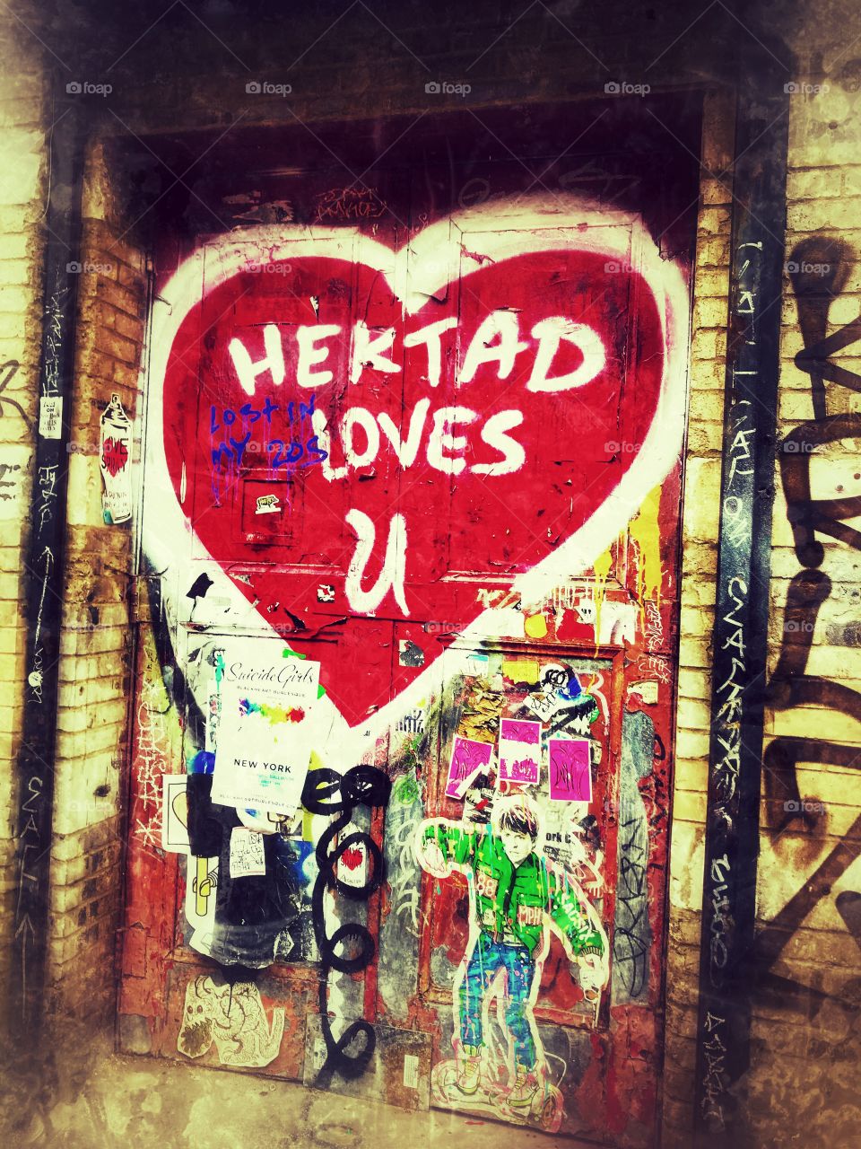 Graffiti on doorway in Greenwich Village New York City 