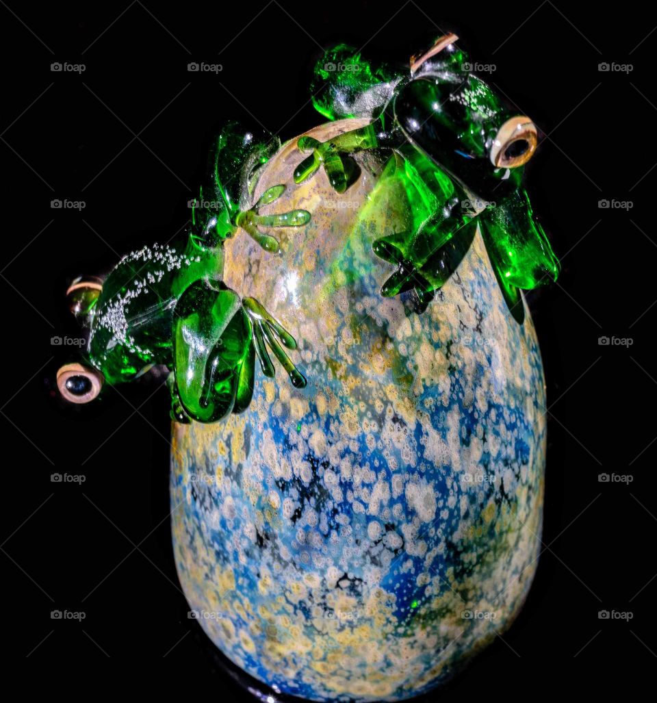 glass frogs on glass egg