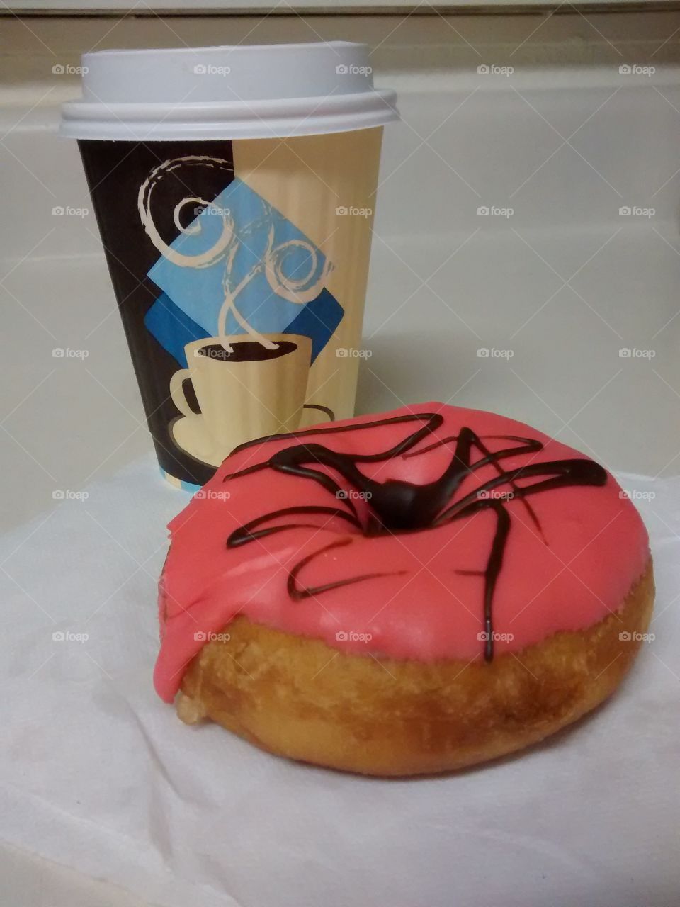 Coffee And A Frosted Doughnut