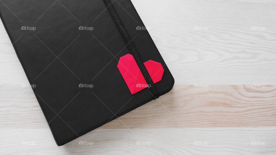 notebook with heart paper