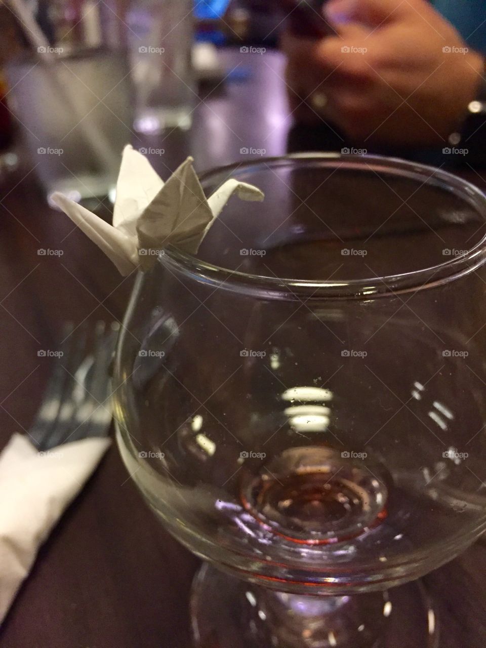 Ted the tiny crane getting drunk off wine at Mox Boarding House
