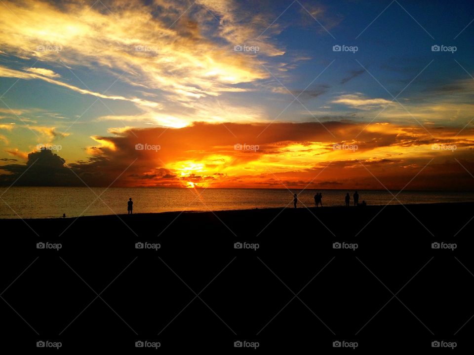 Silhouette of a people at the time of a sunset