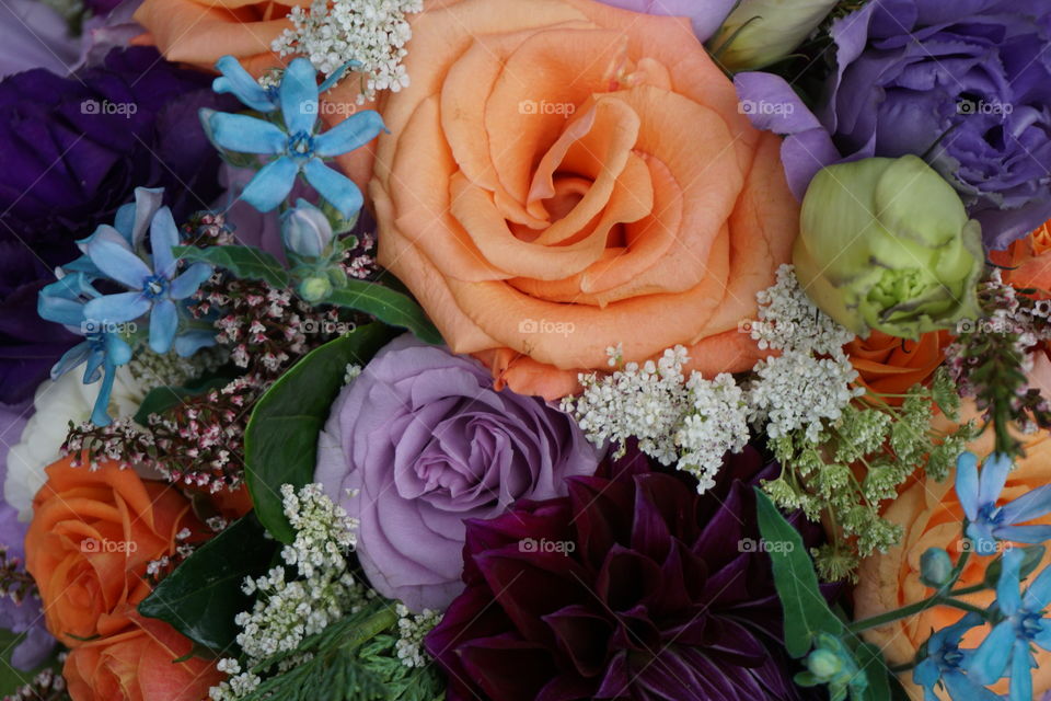 Violet, tangerine, blue shower bouquet 