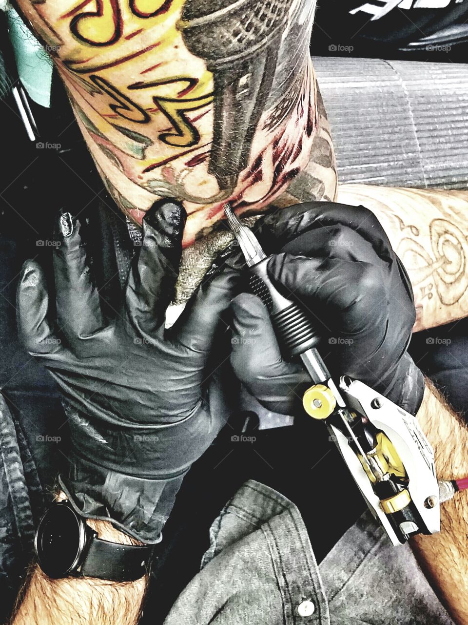 My best friend getting his tattoo sleeve finished.