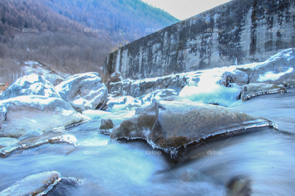 Long exposure shot for water falling in Sondrio city, Italy