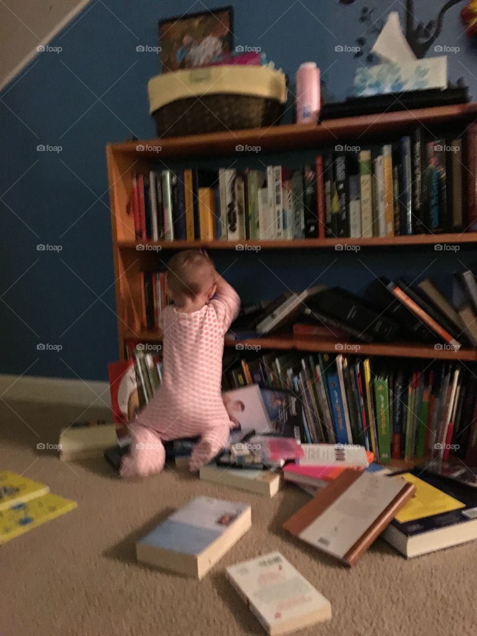 Bookshelf and a baby 