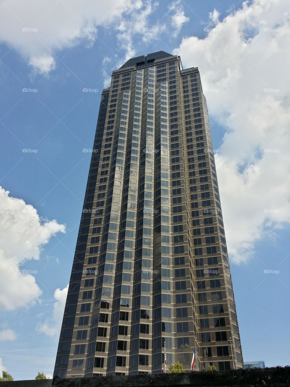 Skyscaper amongst the clouds in Dallas, TX