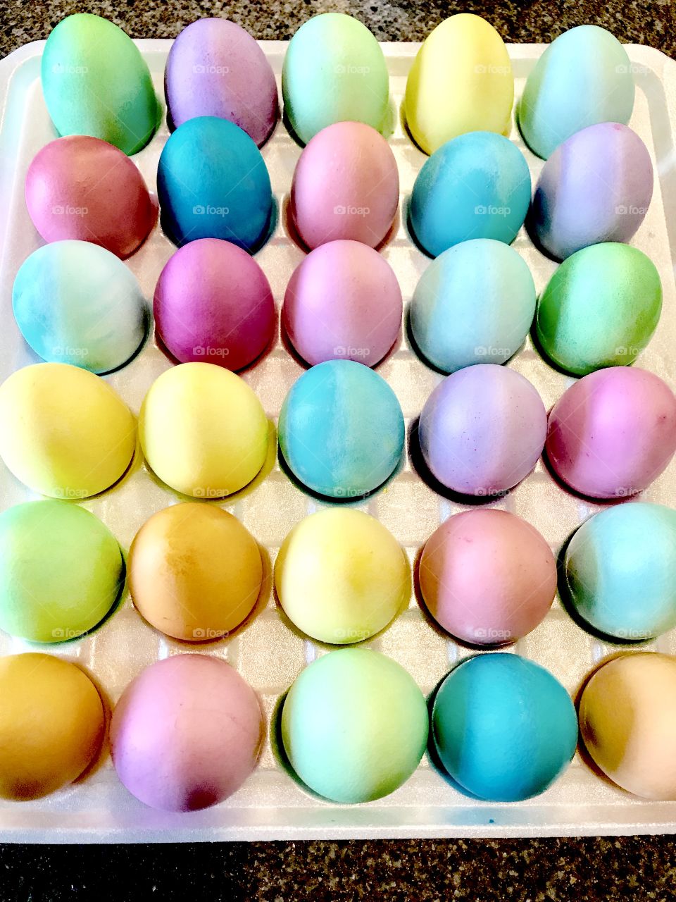 Beautifully multi colored dyed Easter eggs ready to be hidden for the big Easter egg hunt!