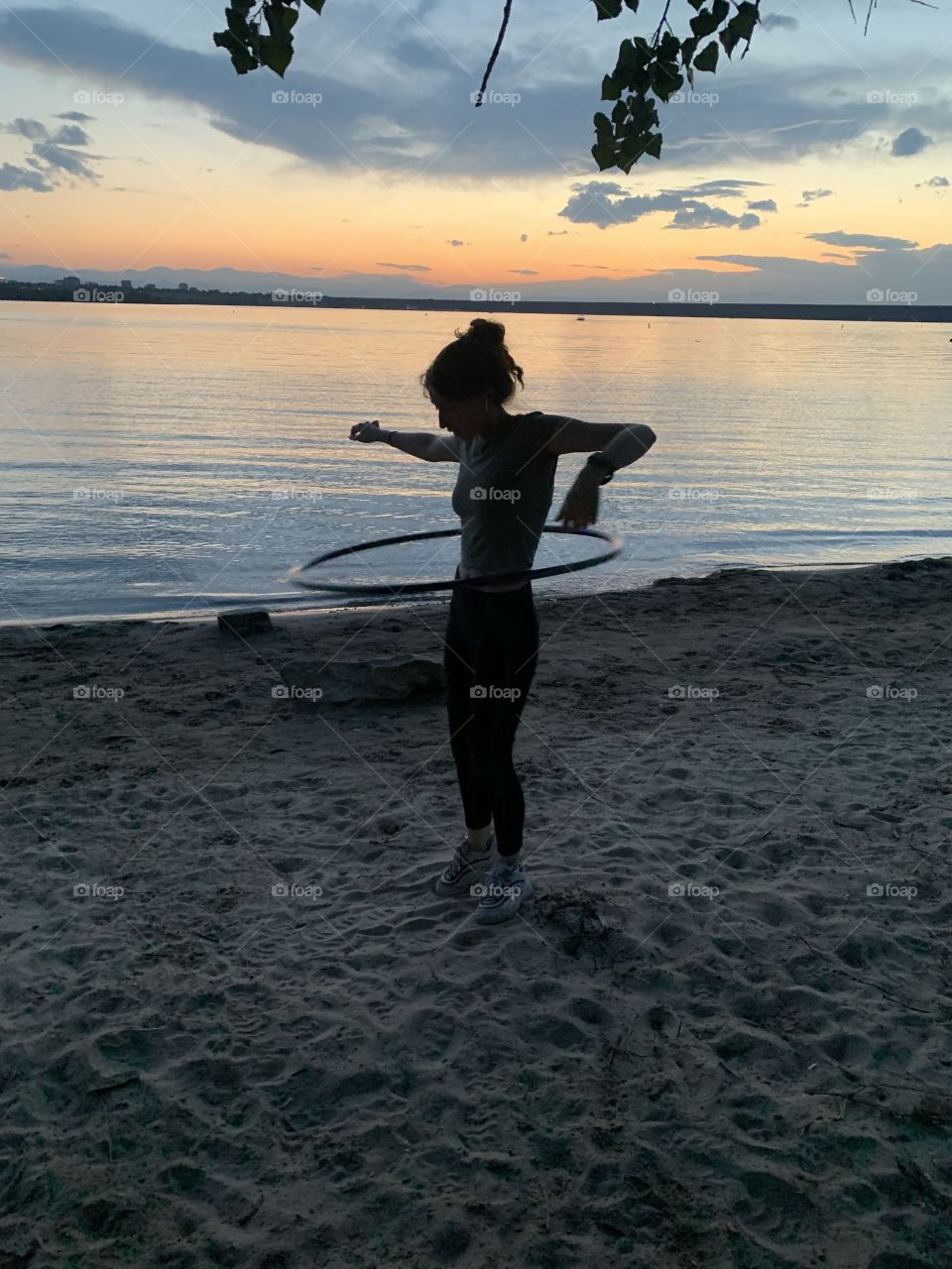 Hula Hooping Outside at the Lake