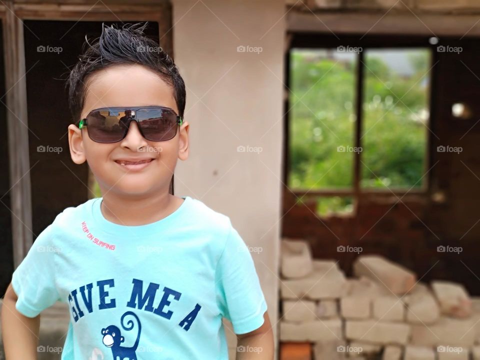 Indian boy with sunglasses