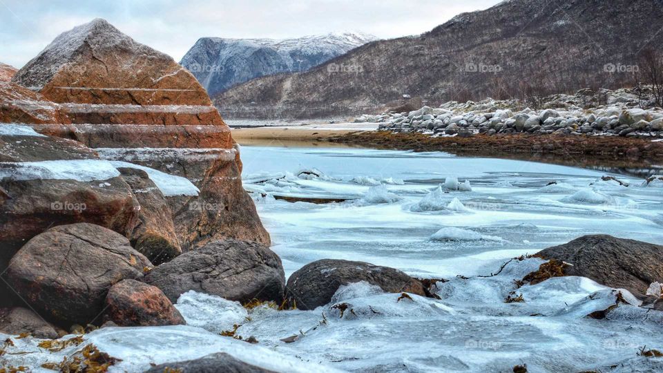 Warm stones in ice