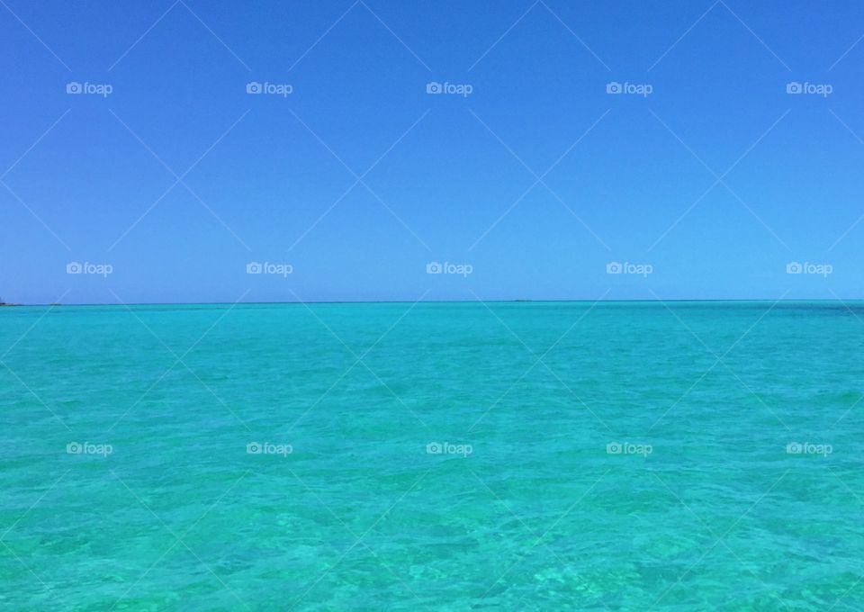 Sea Green to Sky Blue. The Bahamas sea meeting the sky on a beautiful sunny clear day. 