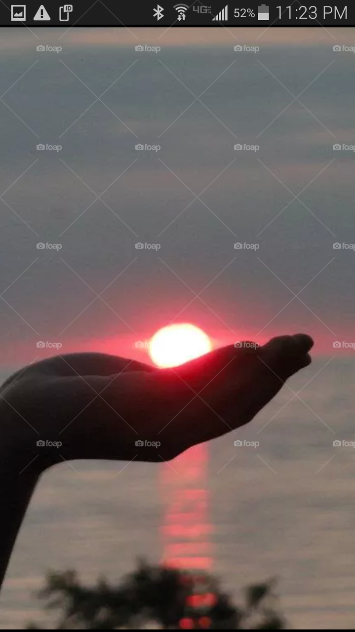 holding the sun