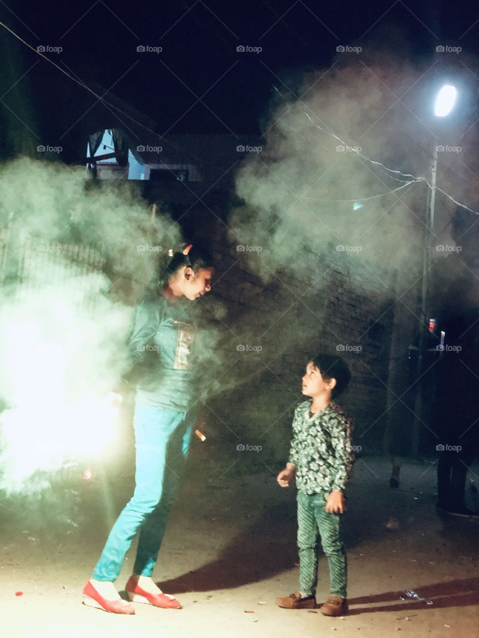Two kids having fun, Diwali 2018 India, light it up kiddies 