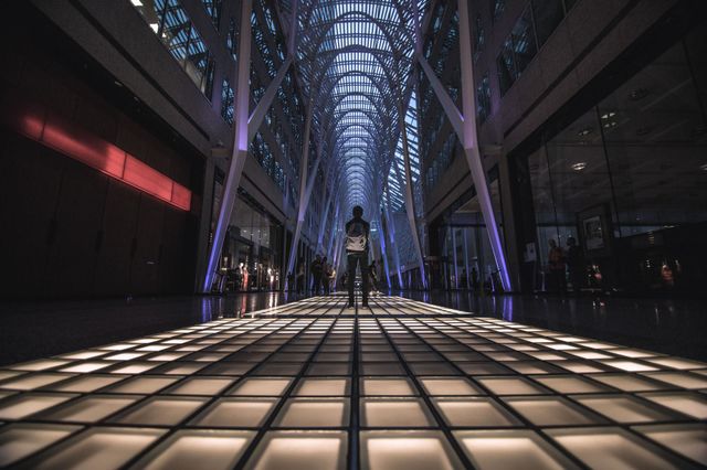 man stands on lit floor,please vote and comment,,thank you all