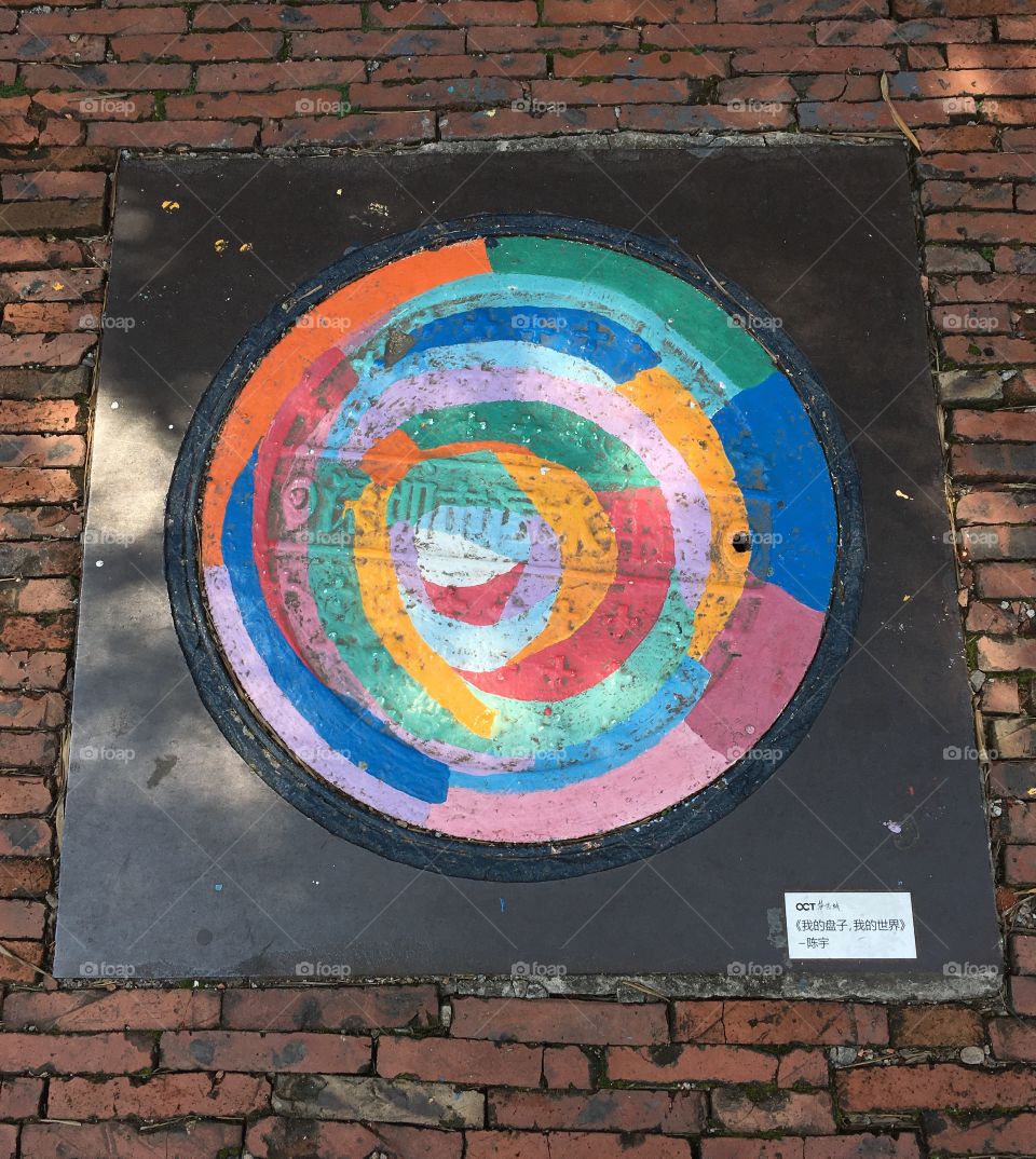 Manhole Cover Painted in Rainbow Colours - Shenzhen, China
