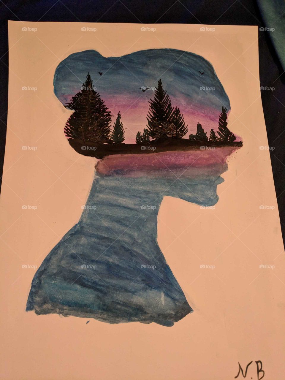 Sons artwork for his sister that was a silhouette of her with a scenery inside.