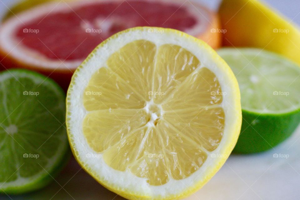 Fruits! - Grapefruit, lime and lemon halves on white background