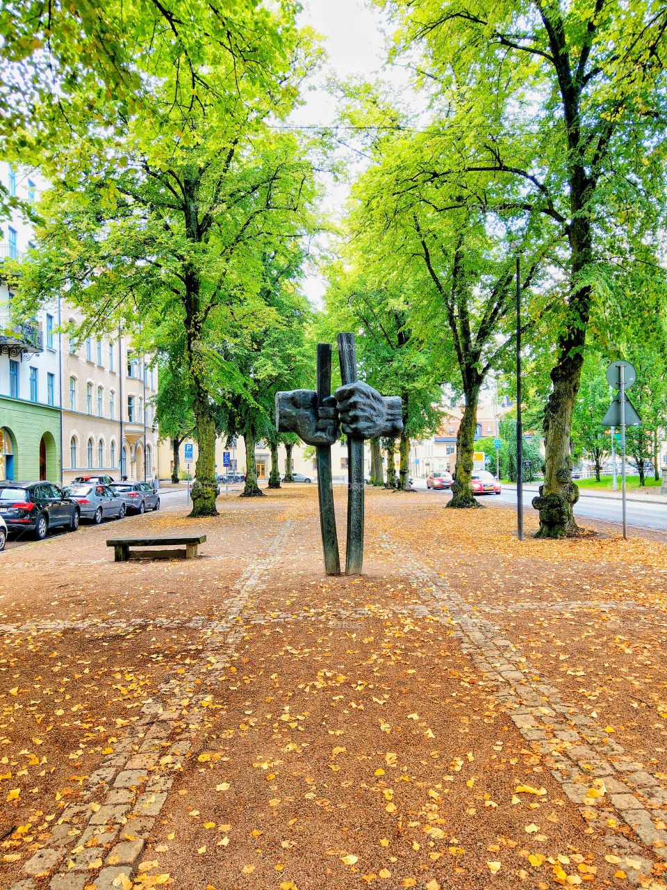 statues that embrace coming together