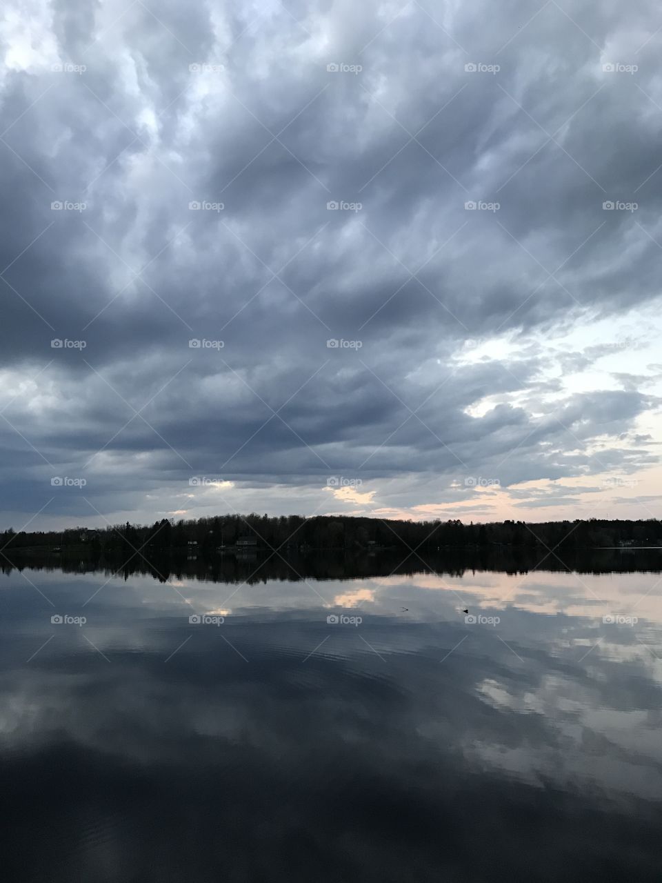 Cloudy sunrise over a lake