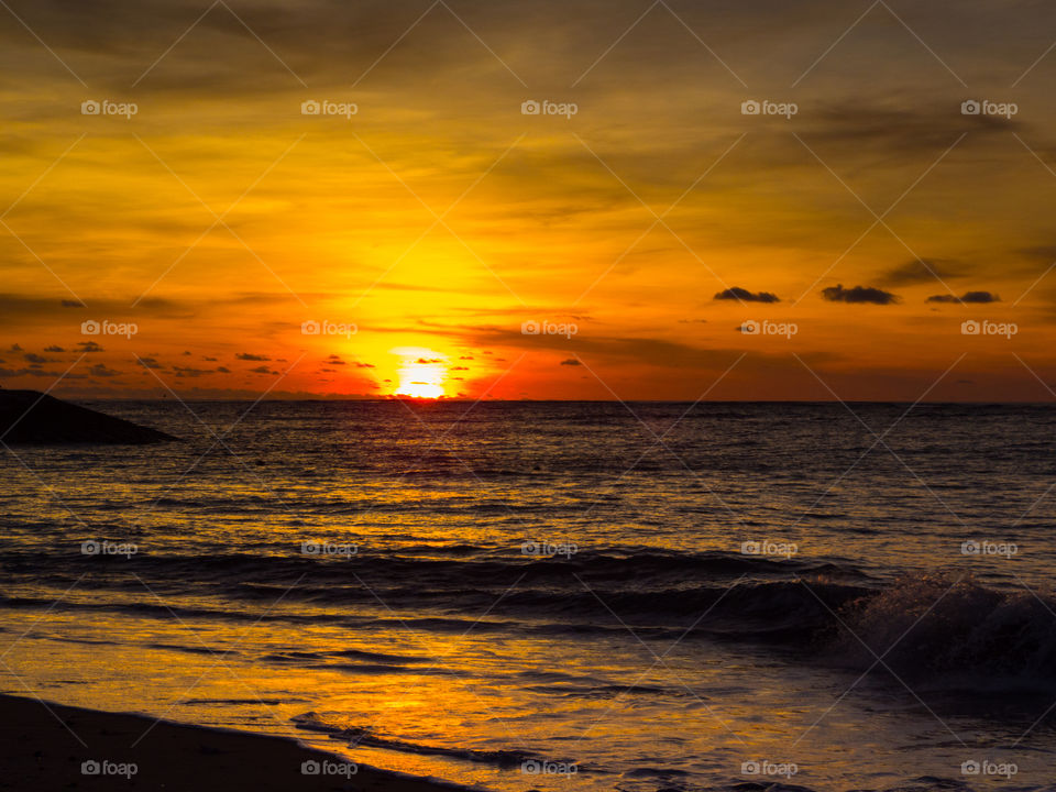 dramatic sunset on the shores of Kuta Beach Bali