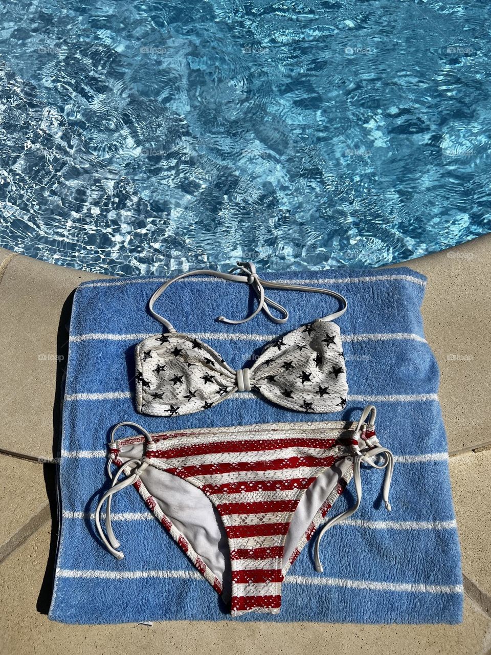 Patriotic American flag swimsuit by the pool