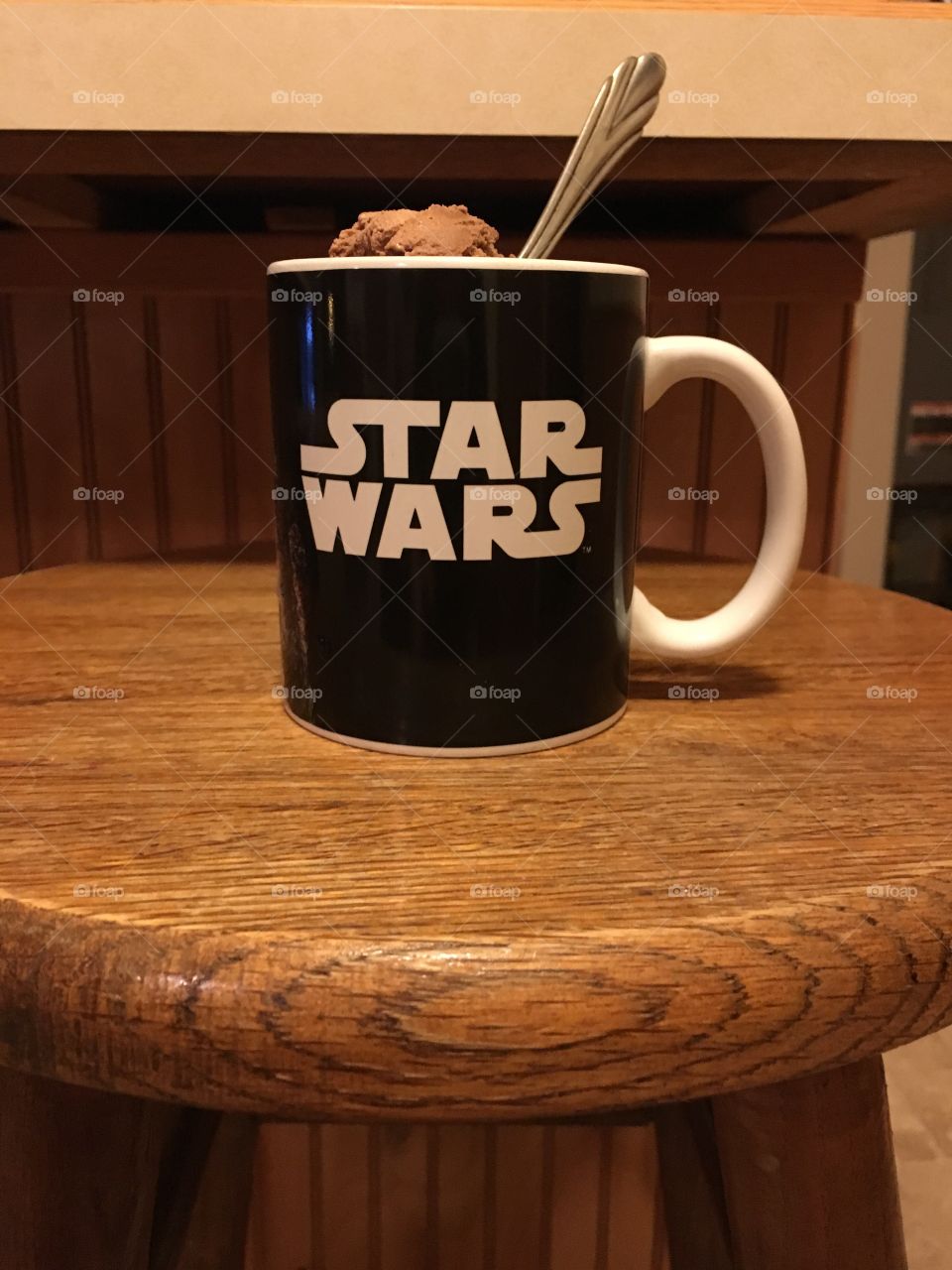 Ice cream time in Star Wars cup. 