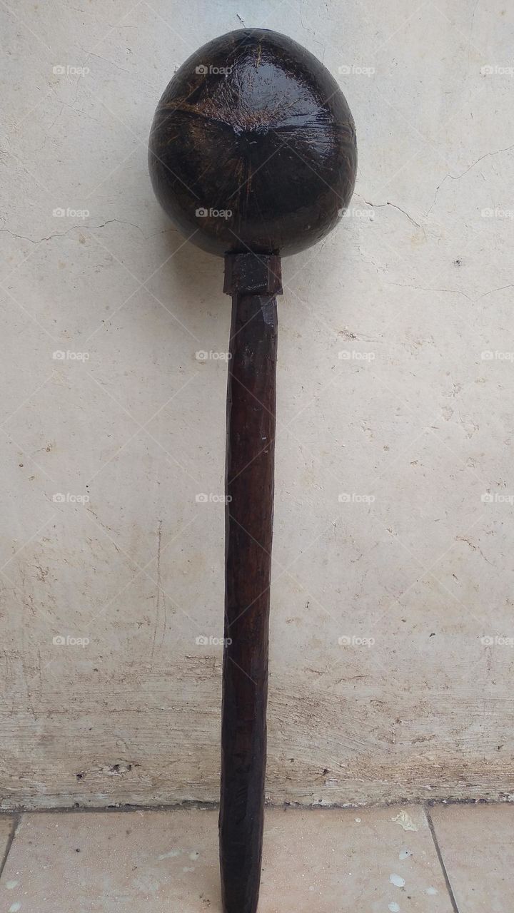 The ancient dipper is made of coconut skin and wood