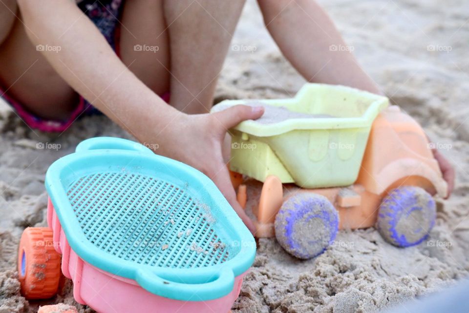 Play with beach toys