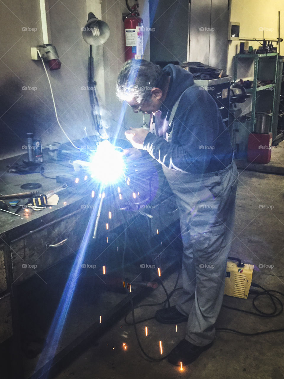 Machinist Craftsman, Working With Welding Machine And Metal In The Workshop
