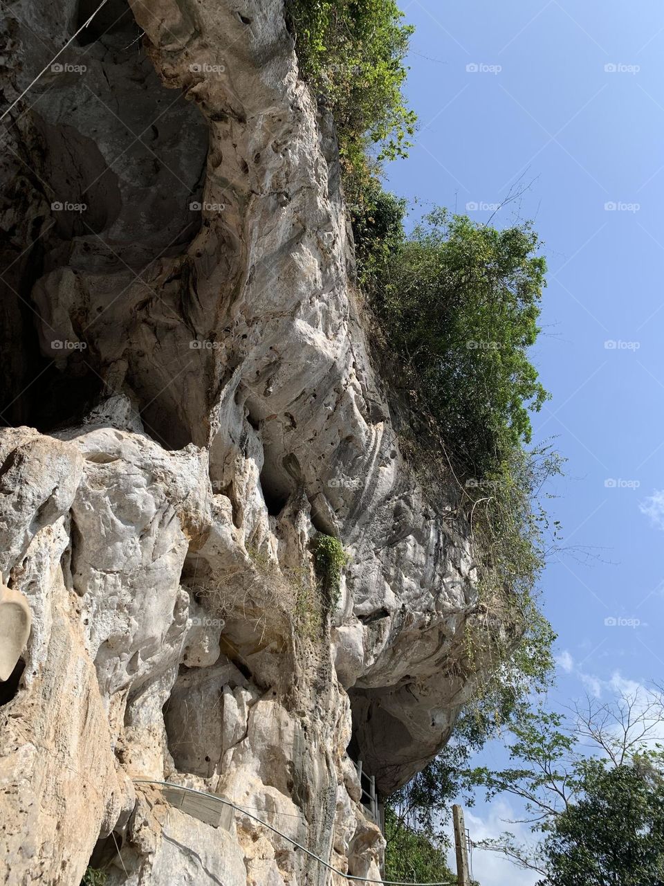 Cave at the cliff in Khao Rup Chang Temple