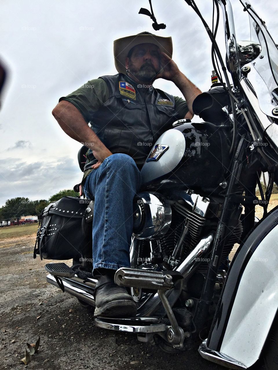 Thinking about the ride. I combat veteran club member thinking about his next ride.