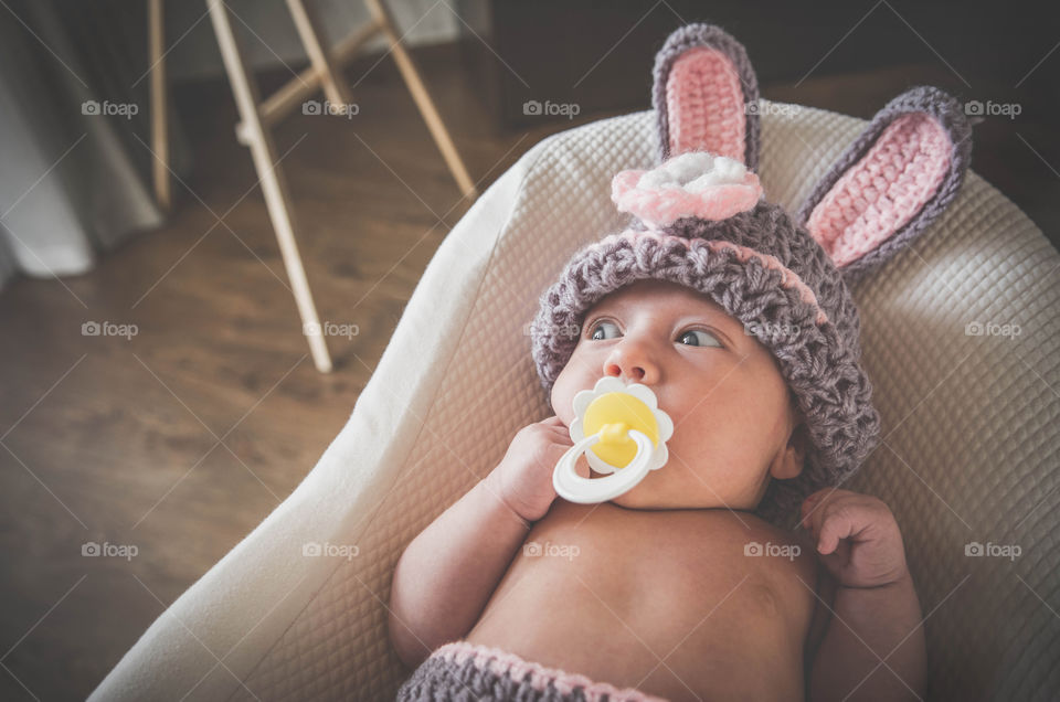 Baby in rabbit costume