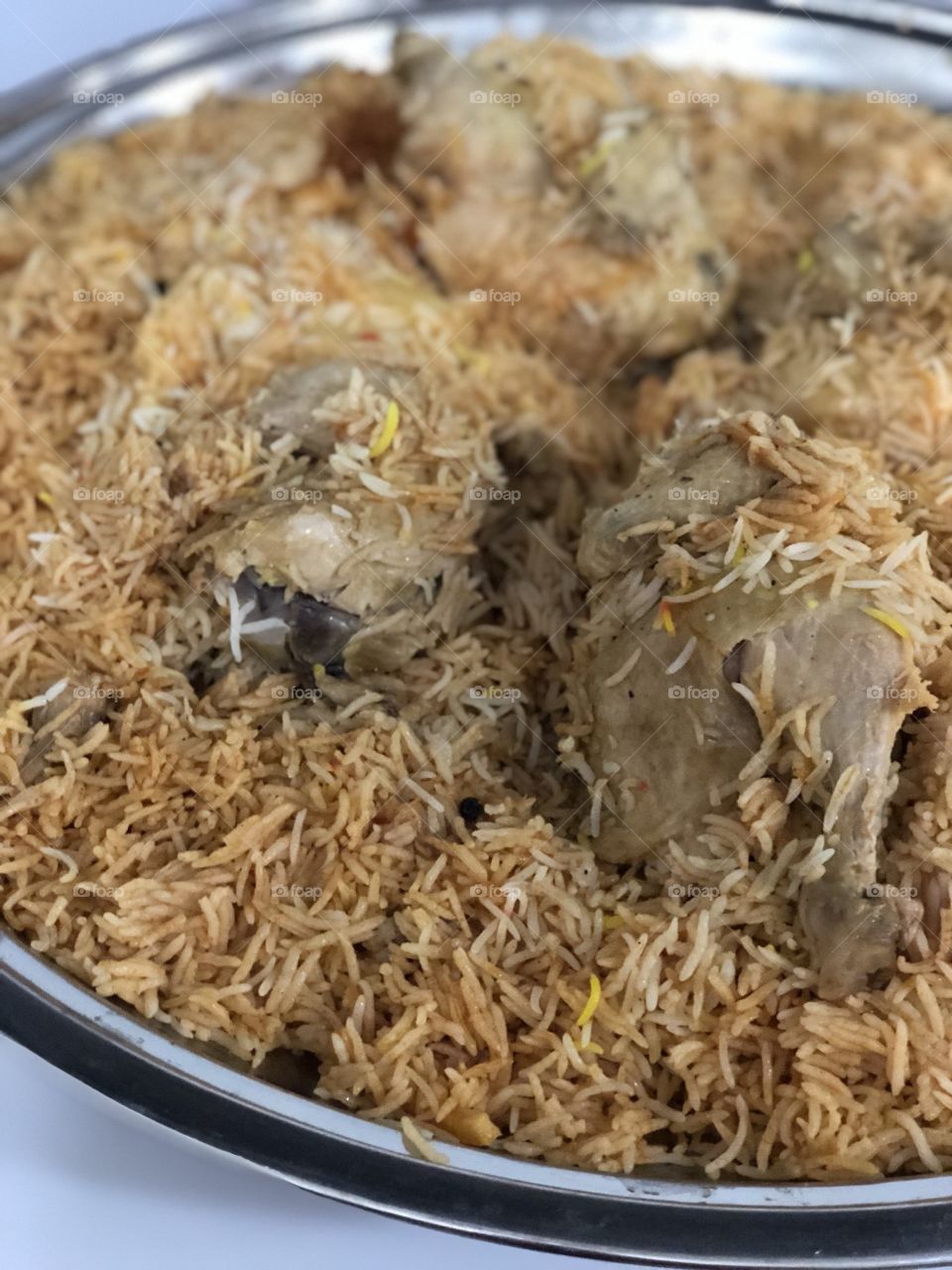 Item name : "Ruz Kabli Dujaj", or Kabli rice with Chicken.this dish basically came from Bukhara Afghanistan but now days The main Afghani cooking concept has changed. Our Saudi chefs cook this dish in a whole new way with awesome twists :)