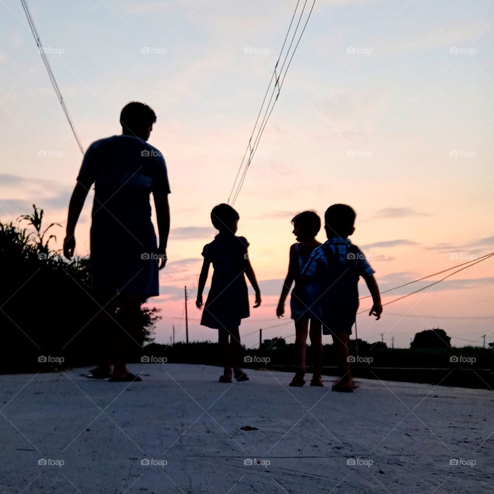a family during evening walk.