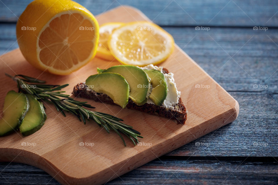 Dietary sandwiches with grain bread, cream cheese and avocado 