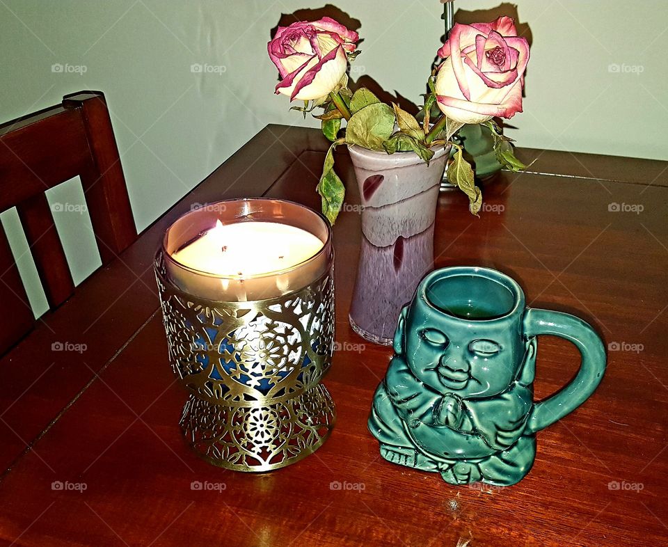 Roses candles and Buddha