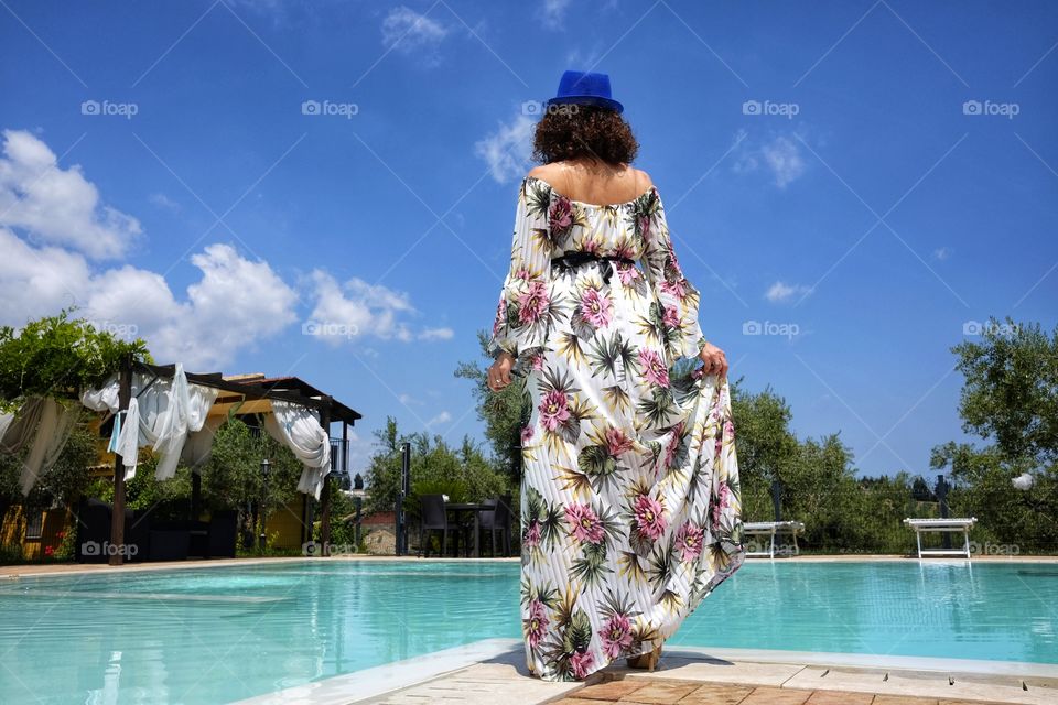 woman dressed in swimming pool