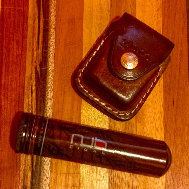 Nub Habano cigar with zippo lighter 