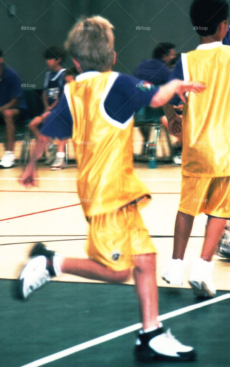 Boy playing basketball 