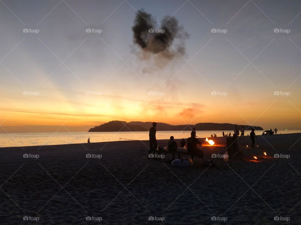 Beach in sunset.