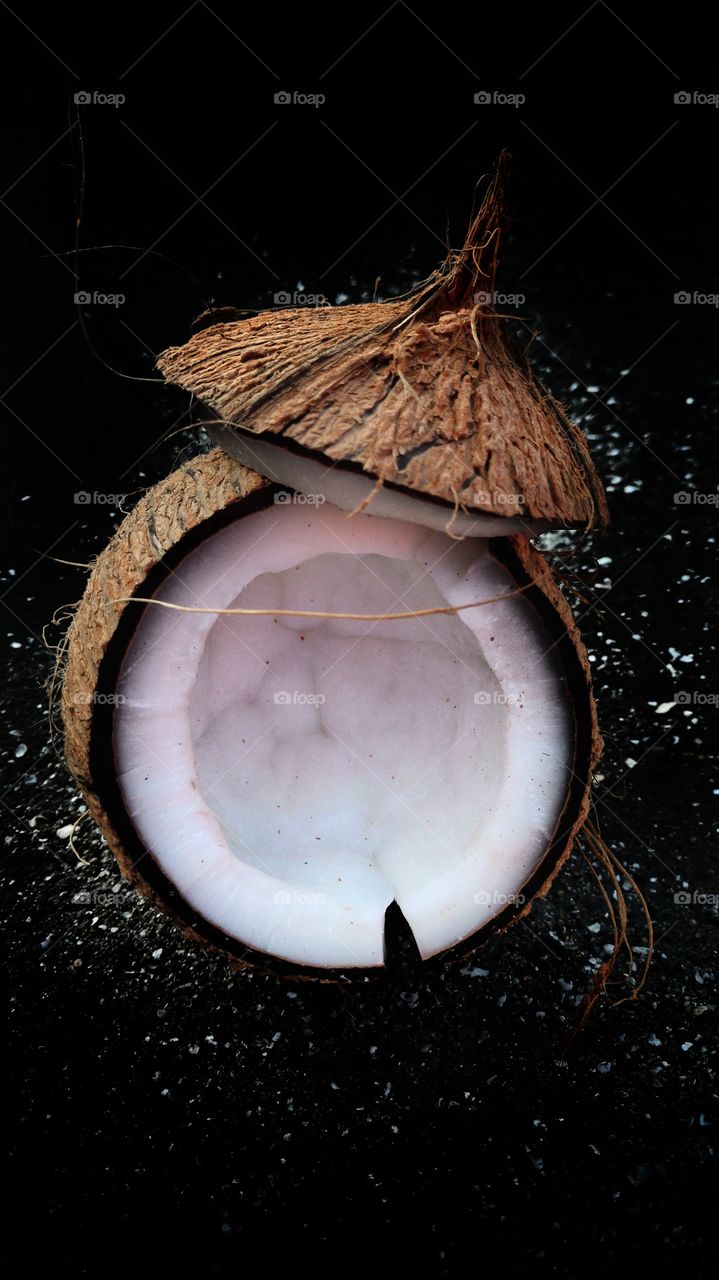 white Broken Coconut in darkness